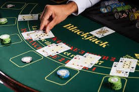 Dealer settles bets and prepares the table for the next round Settlement and next hand preparation